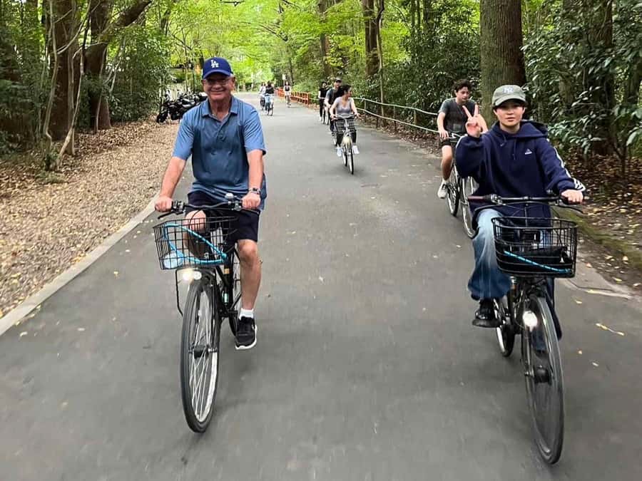 Cycle Kyoto's Hidden Gems & Gion Stroll - The river junction and the lighted-up return ride