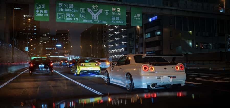 Daikoku & Tokyo Private JDM Tour by 700HP R34 GT-R - Autobacs A PIT stop, where the car crowd shows early