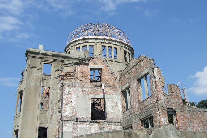 Hiroshima & Miyajima: UNESCO A-Bomb Dome & Itsukushima with Local - Entering Miyajima through Itsukushima Shrine and the Floating Torii