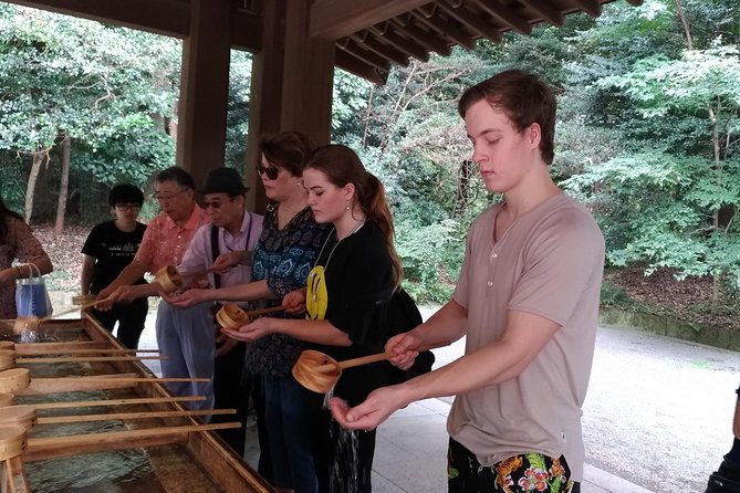 Kyoto Arashiyama & Sagano Bamboo Private Tour with Government-Licensed Guide - Arashiyama classics: Togetsukyo Bridge, bamboo forest street, and Tenryu-ji