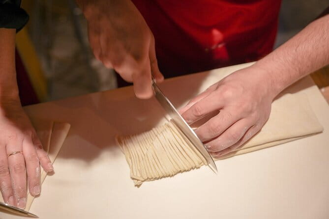 Kyoto Ramen and Gyoza Cooking Class with Professional Chefs - Stop in Kyoto: the kitchen setting and group vibe