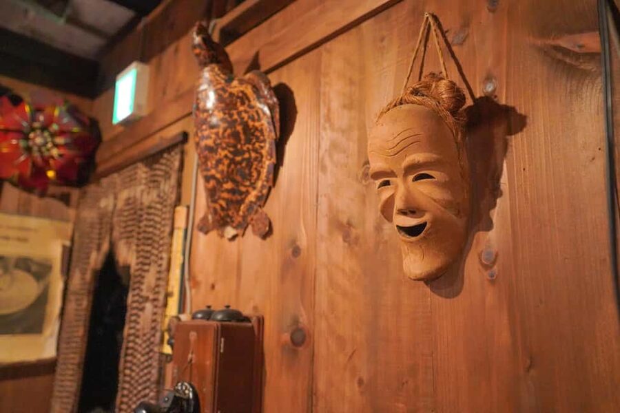 Naha Bar Hopping Tour in Okinawa - Stop 1: the first local izakaya and the habu-shu challenge