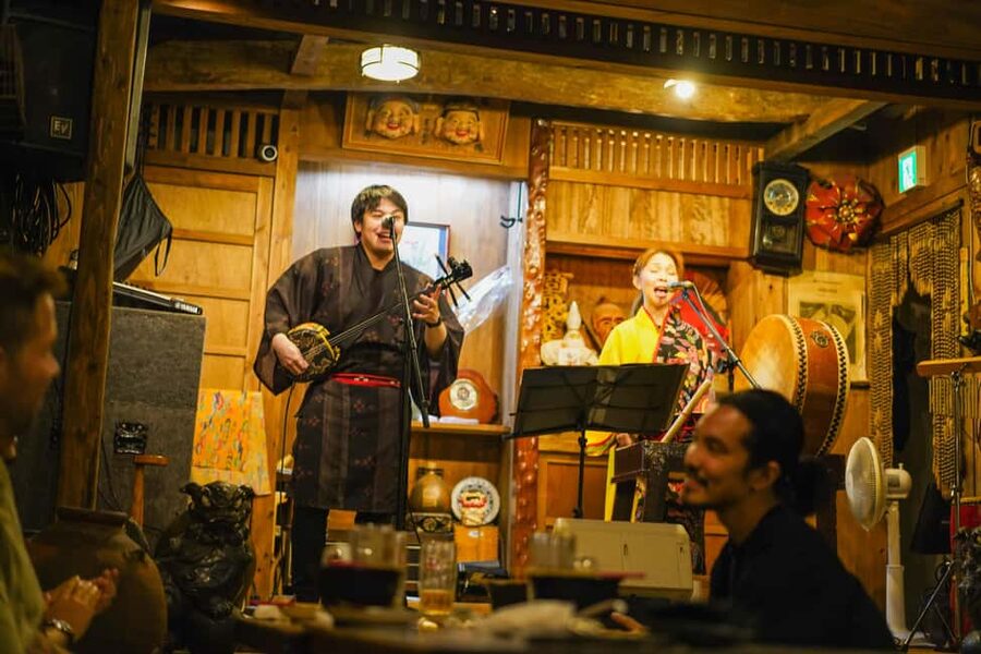 Naha Bar Hopping Tour in Okinawa - Stop 2: chef-prepared Okinawa course meal plus all-you-can-drink