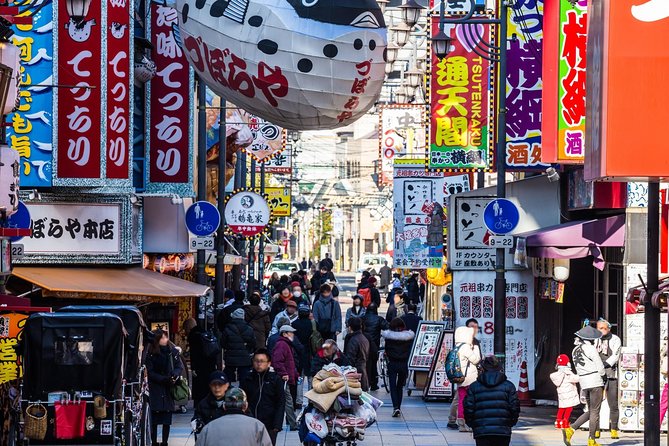 Osaka 6hr Private Walking Tour with Government Licensed Guide - Dotonbori: where Osaka turns into street performance