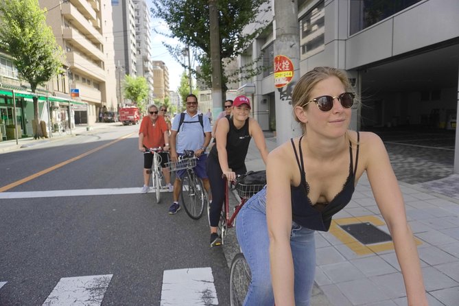Osaka E-Bike Tour With A Local Guide - Den Den Town anime culture and shop-window eye candy