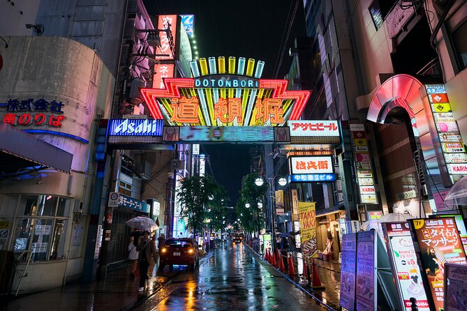 Osaka: Guided Food Tour with 12 Dishes at 4 Local Eateries - Izakaya Mood and Sake Bars, With Room for Local Advice