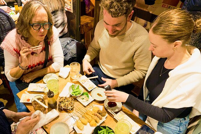 Osaka: Guided Food Tour with 12 Dishes at 4 Local Eateries - How the Guide Improves the Stops (Beyond Just Ordering)
