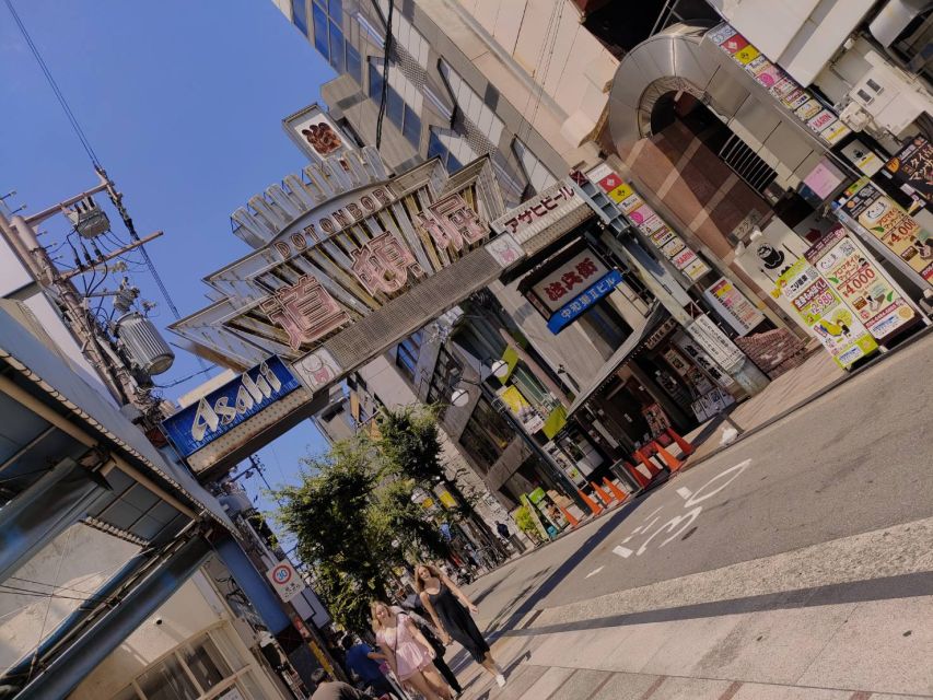 Osaka: Half-day Ultimate Highlights Guided Walking Tour - Kuromon Ichiba Market: “Kitchen of Osaka” and How to Eat with Confidence