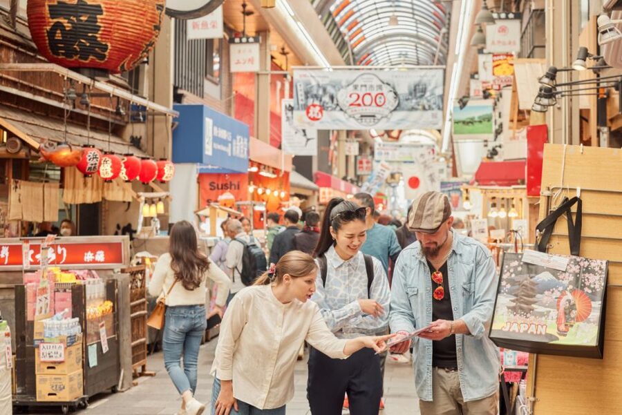 Osaka: Highlights & Hidden Gems Private Walking Tour - Dotonbori and Ebisubashi: neon chaos, guided into sense