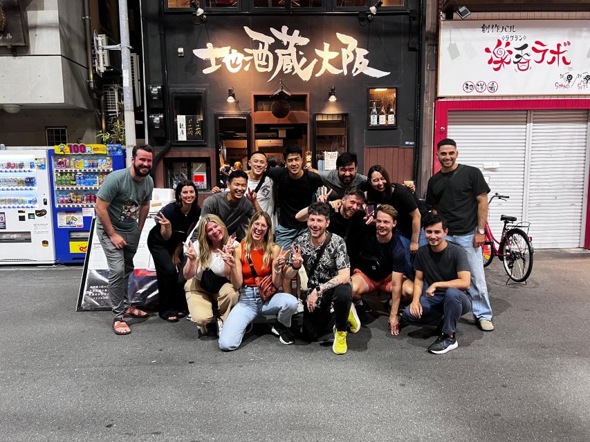 Osaka: Izakaya Bars Guided Walking Tour - Finding the Start Point in Dotombori (Dotombori Humanity Song Monument)
