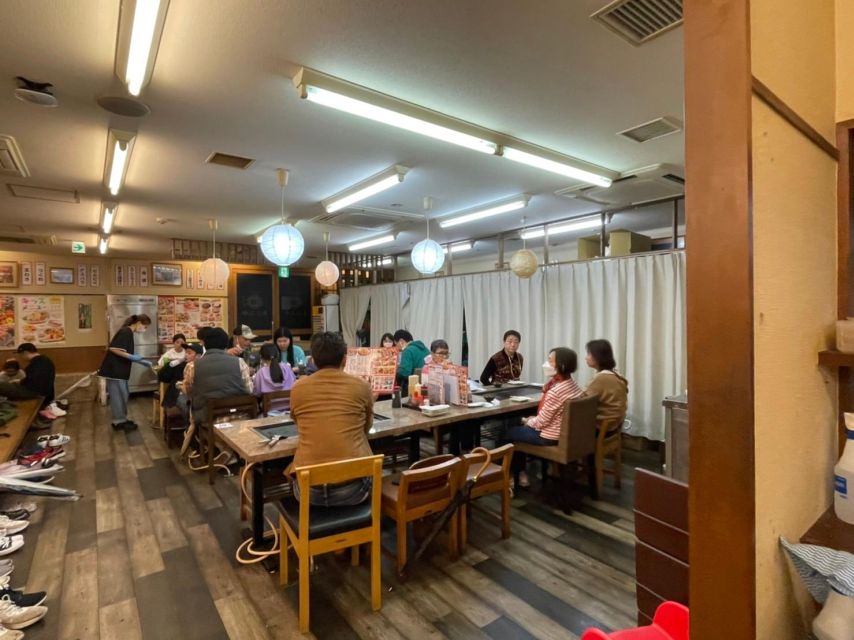Osaka: Local Foodie Tour in Dotonbori and Shinsekai - Escaping Neon Chaos: The Narrow Alley and a Temple Pause