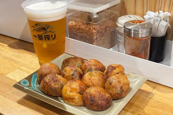 Osaka Night Walk : Discover Umeda Food and Pub - Stop 1: Ohatsutenjin Urasando and Tenjin Food Street