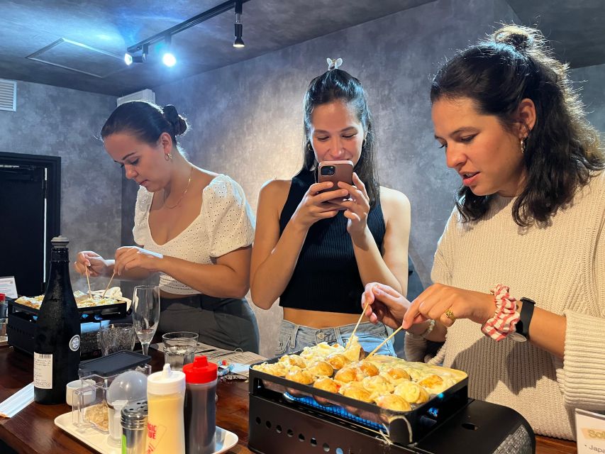 Osaka Sake Tasting with Takoyaki Cooking - Sake tasting with Momo: history, process, then real flavor choices
