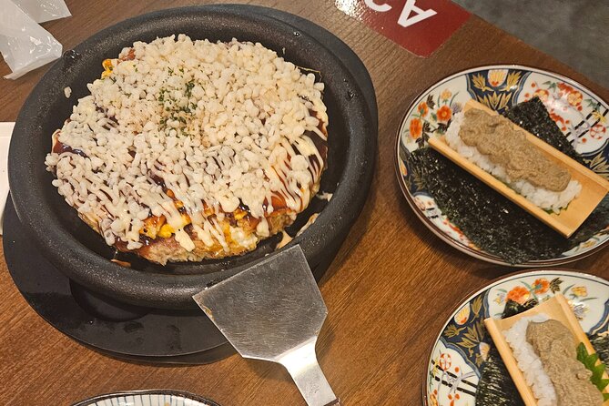 Osaka: Shinsekai Food Tour - 13 Dishes at 5 Local Eateries - Stop 4: Tsutenkaku Tower area for your final views and last bites