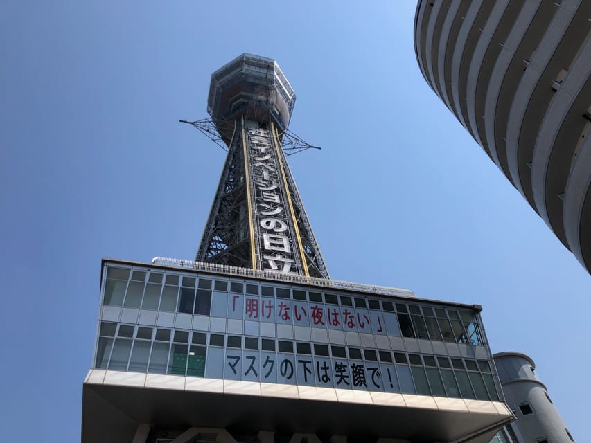 Osaka: Tsutenkaku Tower Entry Ticket - Neon latticework and photo-ready views from above