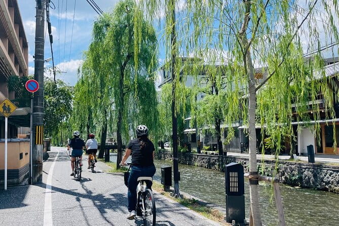 Pedal Adventure Kyoto's iconic landmarks on an e-bike tour - Gion at the start: streets, culture, and a fast “get rolling” moment