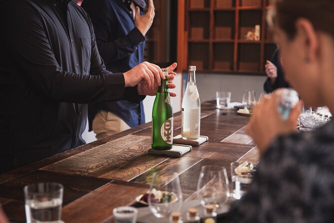 Sake Omakase in Tokyo: Guided Tasting by Certified Sommeliers - The Showa-Era Table and Designer Tasting Room Atmosphere