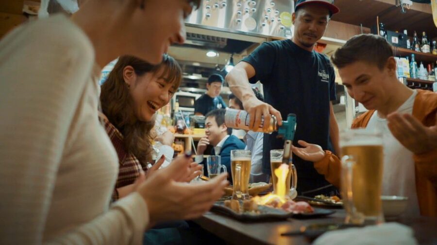Shibuya Meltdown Night Tour: All-You-Can-Drink Bar Hopping - Finding the group under SHIBUYA TSUTAYA, before the crowds hit