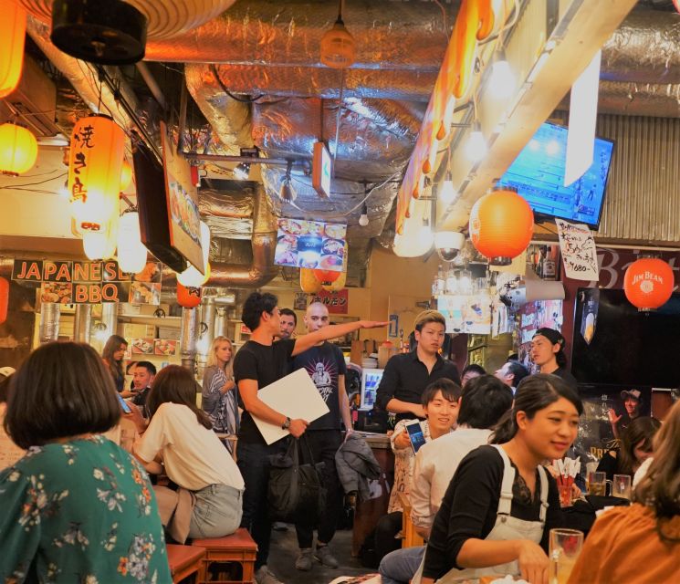 Shibuya Meltdown Night Tour: All-You-Can-Drink Bar Hopping - Shibuya Crossing to first bar: photos, people-watching, and a beer warm-up