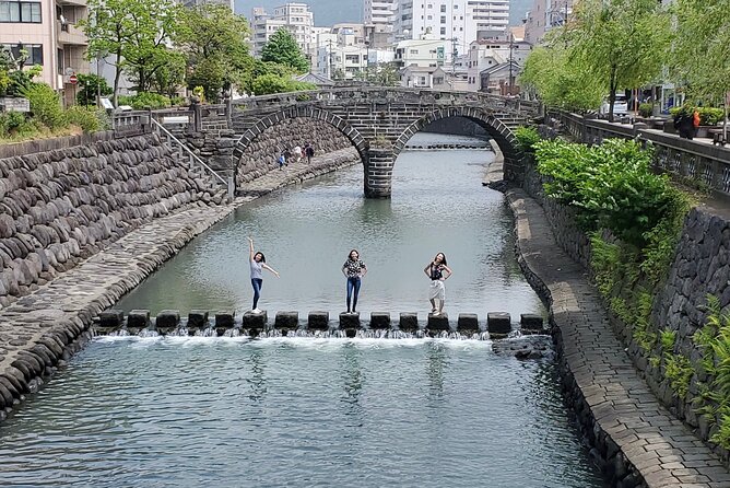 Taste Local Life: Nagasaki's Historical Street Walking Tour - Motenashiya and Megane-bashi: Tourist Info Meets Iconic Stonework