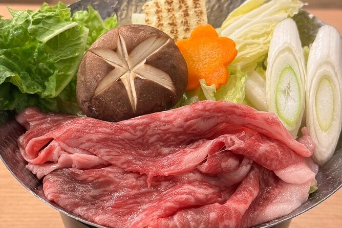 the SUMO show with Dinner - Dinner Details: Sukiyaki, Chanko-Style Soup, Rice, and Ice Cream