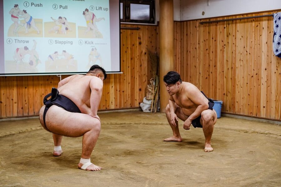 Tokyo: Authentic Sumo Wrestling Experience with Lunch - Touring the sumo stable: dining room, bath area, practice space