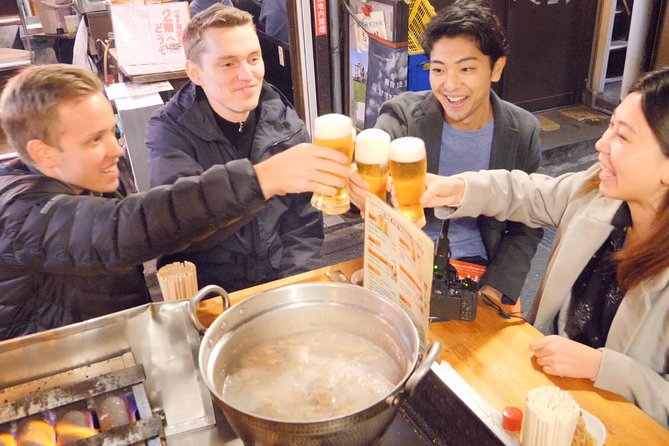 Tokyo Bar Hopping Tour in Shinjuku (All-You-Can-Drink + Dinner) - Kabukicho District Stop: From Showy Streets to Small-Plate Tables