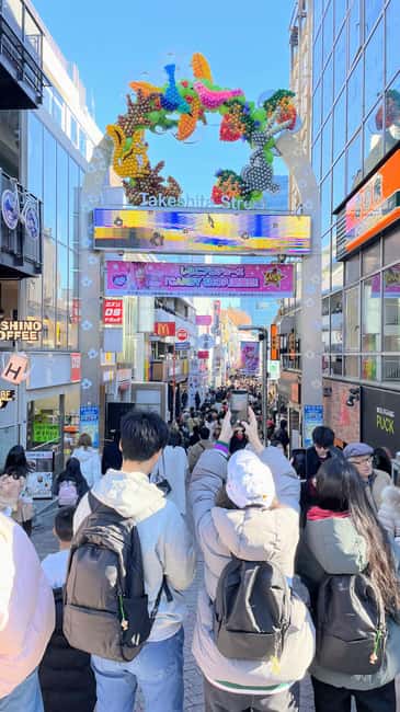 Tokyo: Meiji Jingu, Harajuku, Shibuya, and Shijuku Tour - Moving through Harajuku beyond Takeshita: Kiddy Land, boutiques, and street art