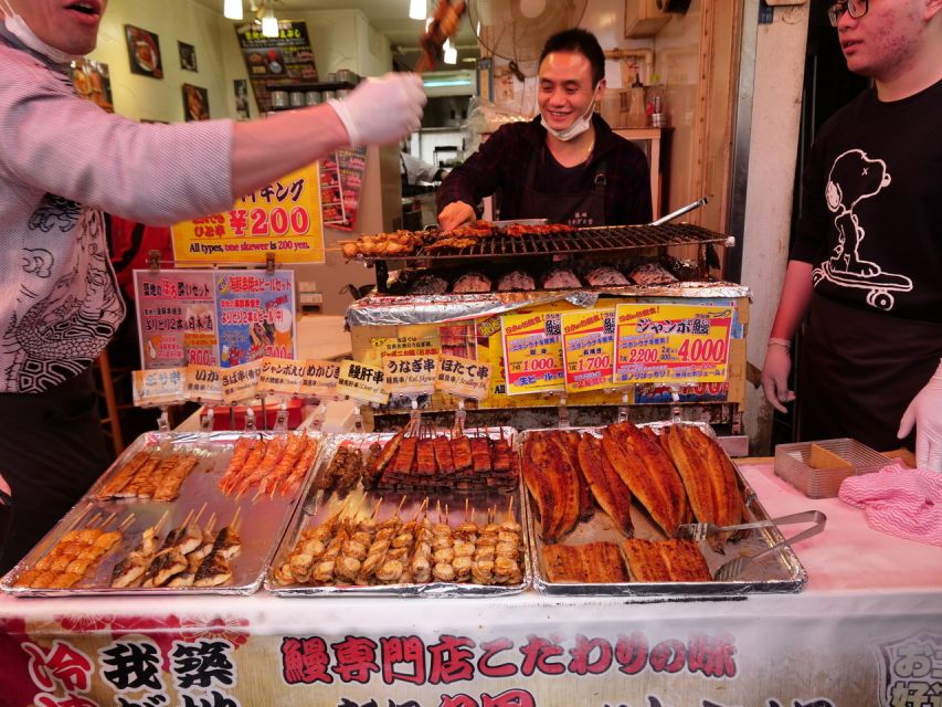 Tokyo: Tsukiji Fish Market Tour with 6 Stops & Seafood Lunch - Starting at Tsukiji Honan-ji gate: setting the tone