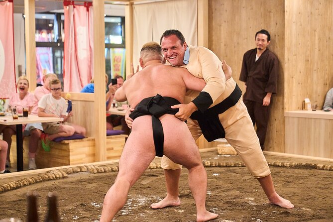 TokyoSumoShow, ChickenHotPot, and Mochi-Pounding by Pro Wrestlers - Mochi pounding: messy fun, and very age-friendly