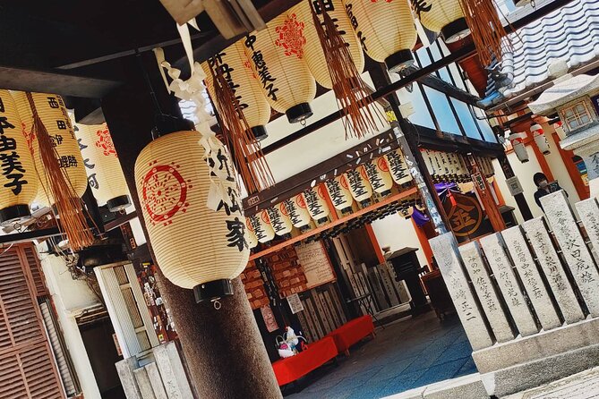 Ultimate Osaka Walking Tour: Castle, Dotonbori & Hidden Gems - Dotonbori canal glow, Hozenji Yokocho lanes, and Hozenji Temple