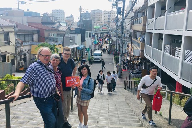 Yanaka Historical Walking Tour in Tokyo's Old Town - Stop 2: Yanaka backstreets, real neighborhood life, and small bites